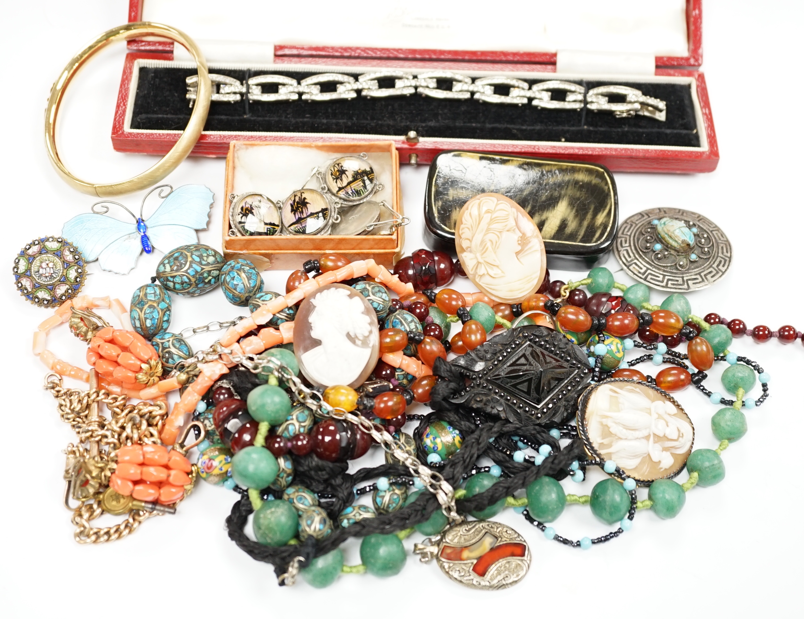 A group of assorted antique and later jewellery, including costume, paste set bracelet, gold plated albert, cameo shell brooch, micro mosaic brooch, silver and enamelled butterfly brooch, etc.